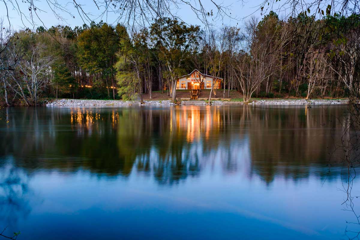 hiwassee river weddings venue reflecting in the blue water of the river in Delano TN