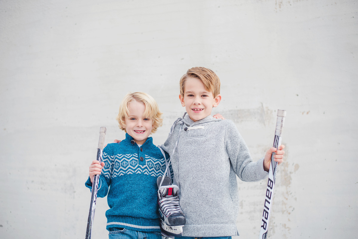 children dressed for hockey themed family photos at Knoxville Civic Coliseum