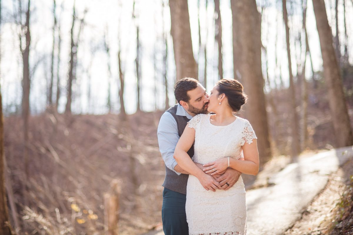 groom kissing his bride on L:aurel Fall trail off Little River Rd Gatlinburg TN