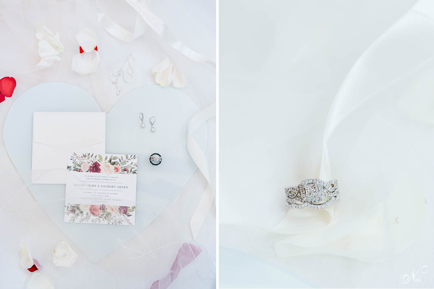 styled wedding details on light blue glass heart. and a wedding ring and engagement ring with white ribbon.
