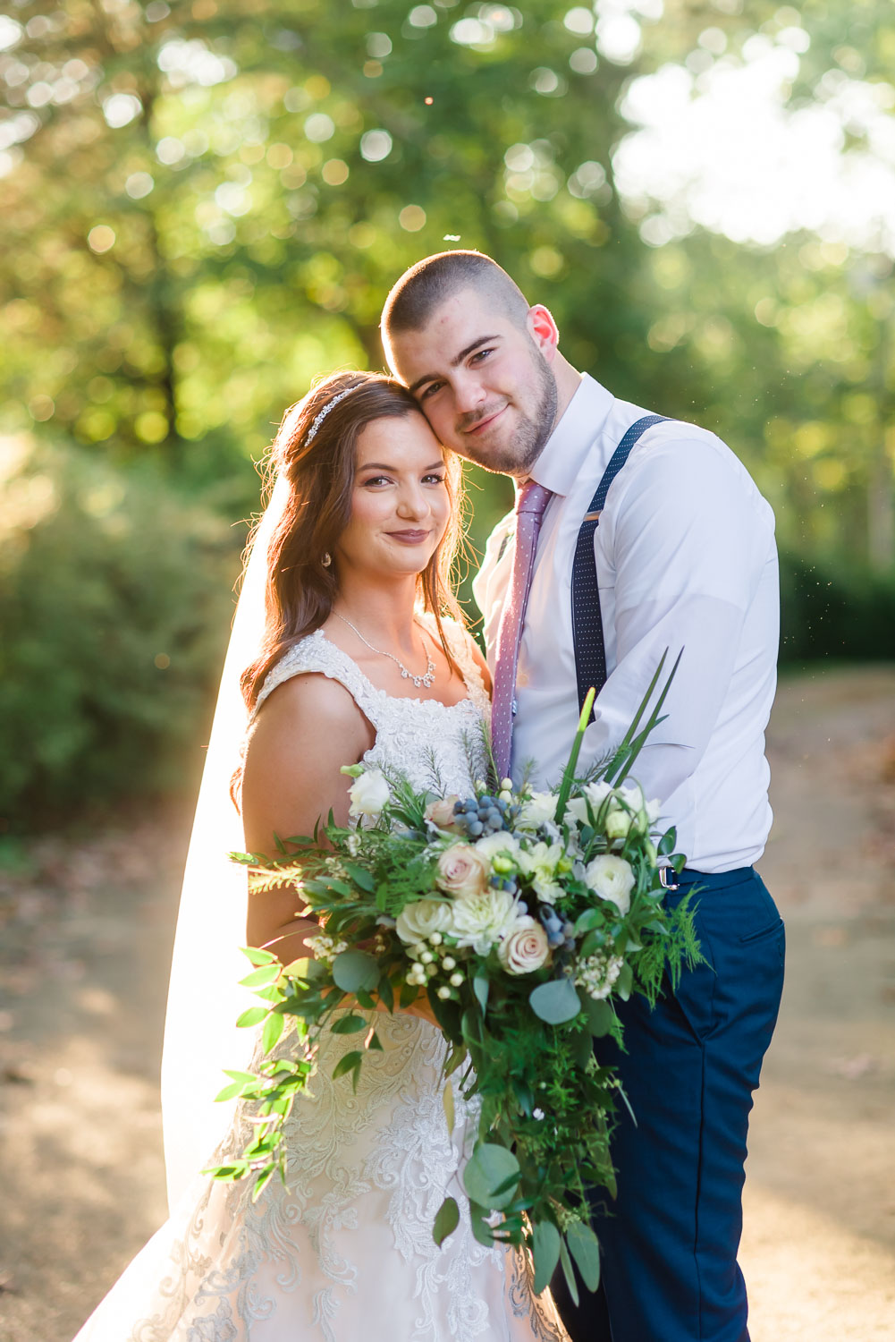 Right in the middle of the road was the best Outside locations for bride and groom portraits with golden sunlight in North Knoxville TN