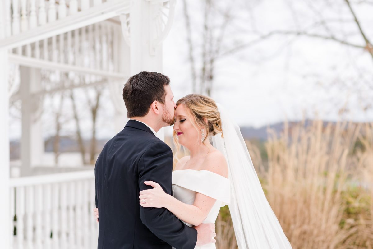 groom and bride outside near the second gazebo at Whitestone Country inn in kningston TN
