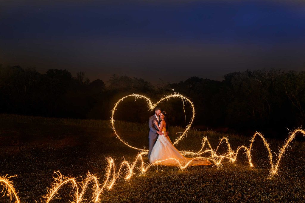 sparkler wedding picture at night